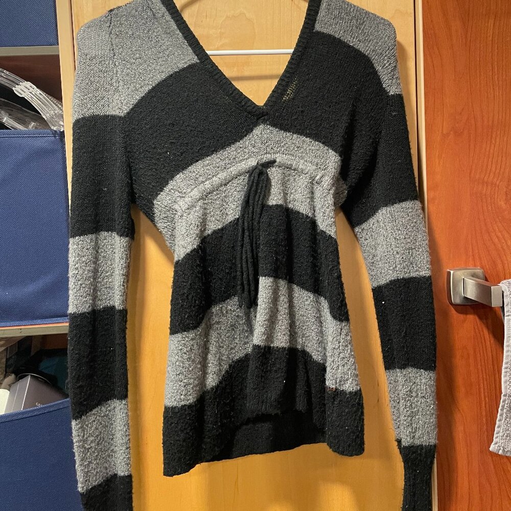 Long sleeved black and grey shirt with hood